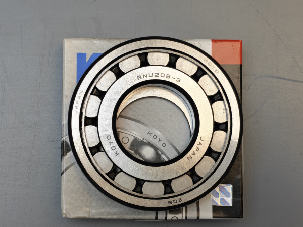ПОДШИПНИК ВЕДОМОГО ШКИВА ПЕРЕДНИЙ RNU208-3 JF011E KOYO